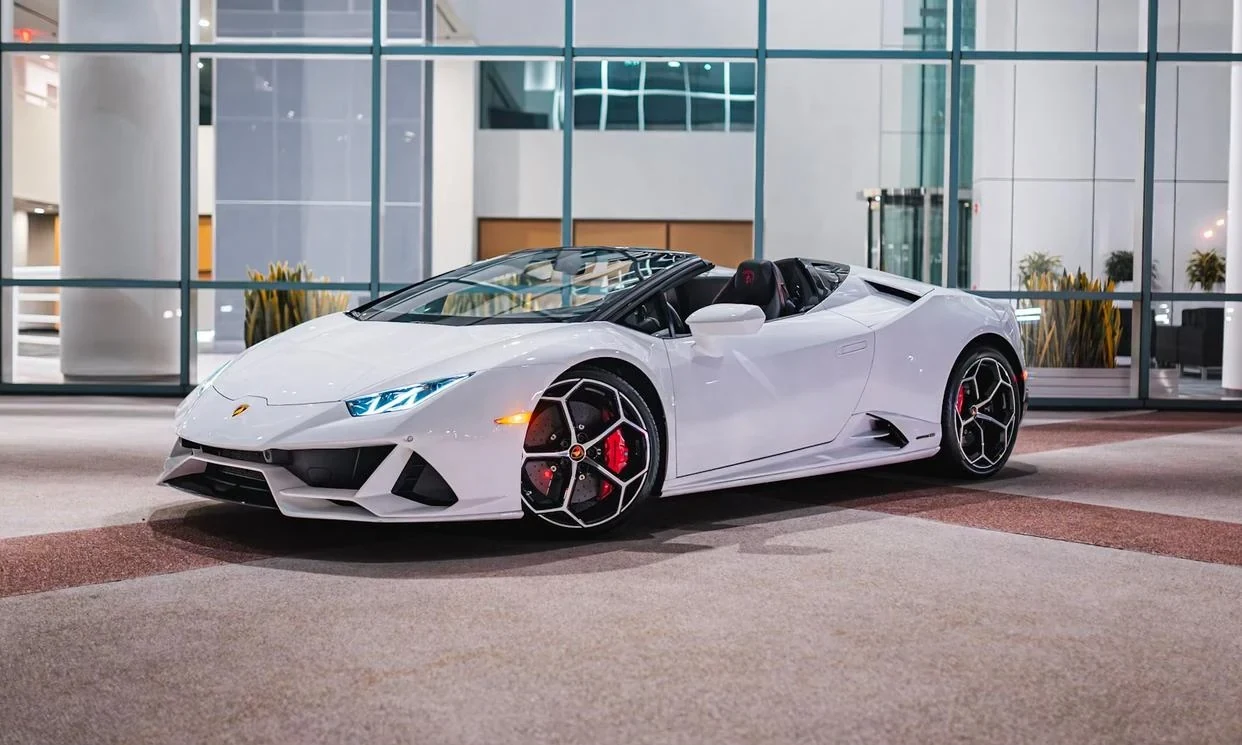 White Lamborghini Huracan EVO Spyder with its roof open